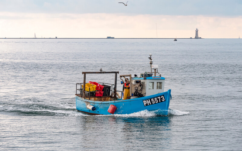 A small-scale fishing boat off of Plymouth, U.K.