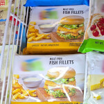 An array of plant-based seafood products inside a display case