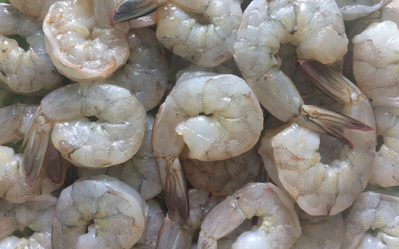 A pile of raw Easy Peel shrimp