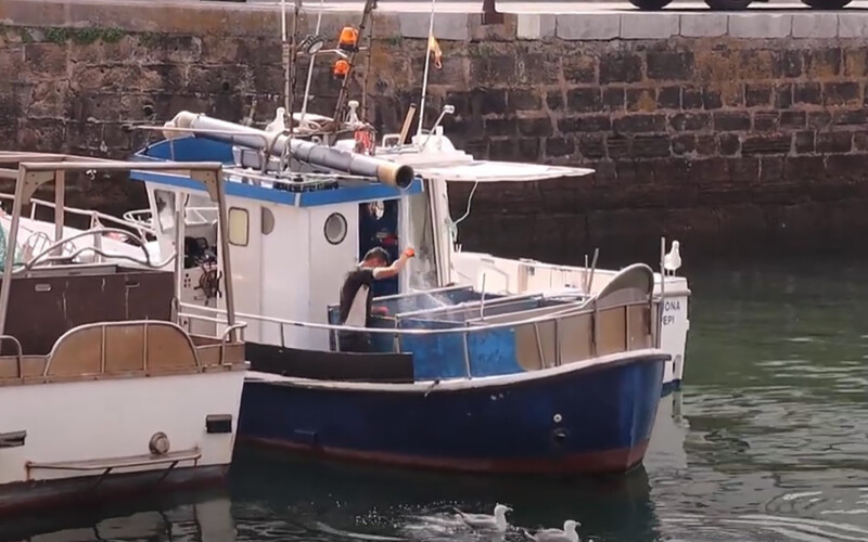 A fisher on a boat in Europe