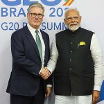 U.K. Prime Minister Keir Starmer and India Prime Minister Narendra Modi shaking hands