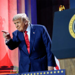 U.S. President Donald Trump pointing