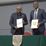 WorldFish Director General Essam Yassin Mohammed (left) and Côte d’Ivoire Minister of Animal Resources and Fisheries Sidi Toure celebrating the project's launch