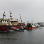 A pair of fishing boats in the town of Dingle, Ireland