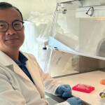 Kevin Xu Zhong conducting molecular biology work