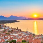 Sunset over the island of Poros in Greece