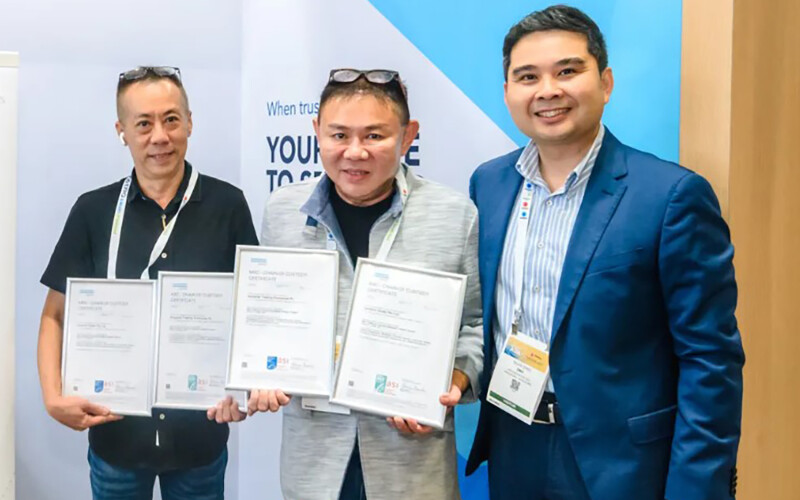 Anthony Lim, manager at Junshin Sushi, Chris Tan, director at Songlilai Trading Enterprise PL, and Silas Ding, area manager for Southeast Asia at DNV, celebrated the certifications at Seafood Expo Asia in Singapore