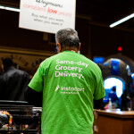 An Instacart shopper at a grocery store