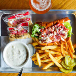 A lobster roll on a tray