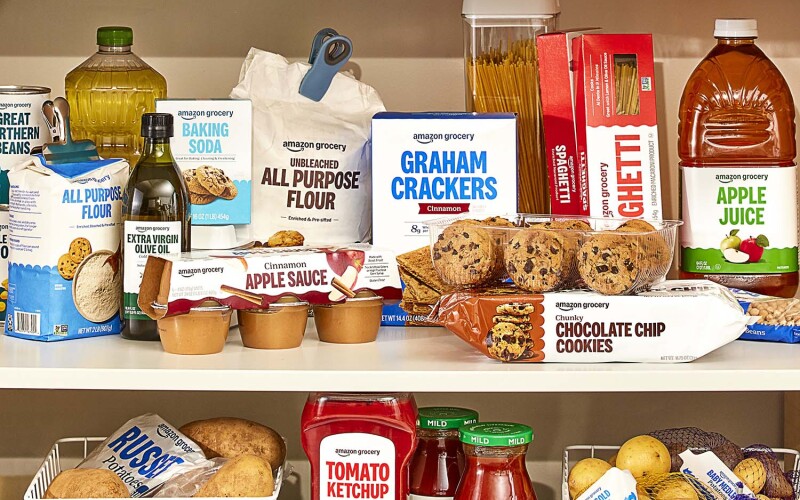 A shelf with Amazon Grocery branded goods
