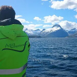 An Aqua Kompetanse employee on a boat