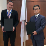 FAO Representative in Somalia Etienne Peterschmitt and Japan's Ambassador to Somalia Matsuura Hiroshi signing the agreement