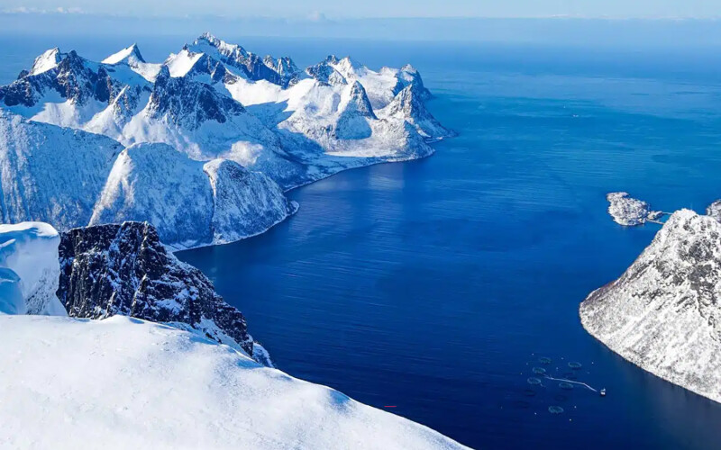 An aerial shot of a SalMar salmon farm