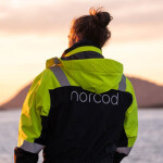 A Norcod employee at sunset