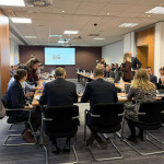 A meeting in an Edinburgh conference room