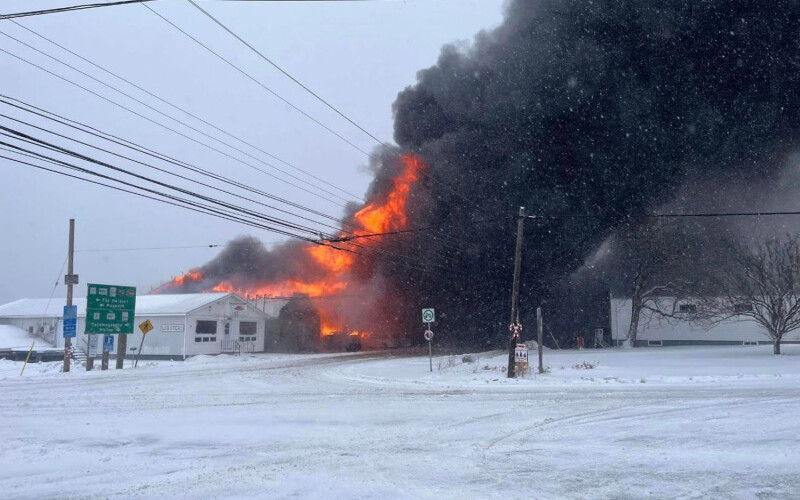 An early photo of the fire at the Aquashell processing facility