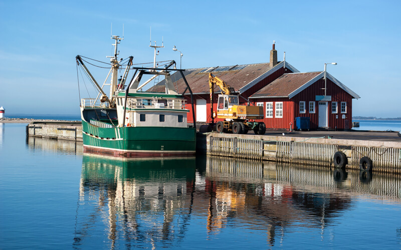 A fishing boat at a harbor in Denmark