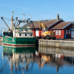 A fishing boat at a harbor in Denmark
