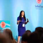 Nomi Prins on stage at Seafood Expo North America