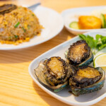 Abalone served on a dish at a restaurant