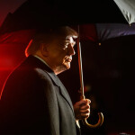 U.S. President Donald Trump with an umbrella