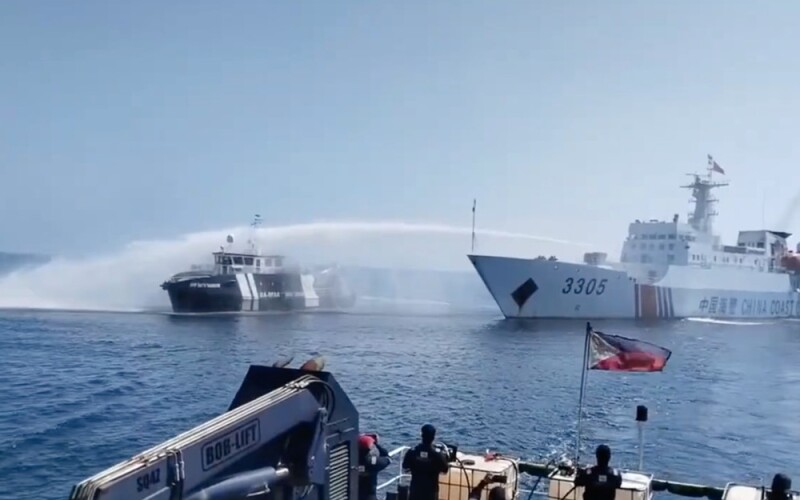 Chinese Coast Guard vessels using water cannons
