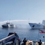Chinese Coast Guard vessels using water cannons