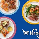 Plates with steak, lobster, and crab on them