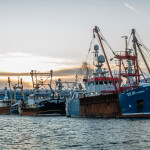 A fishing harbor in the U.K. at sunset