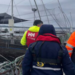 Invermar employees guiding a Sernapesca official