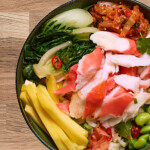 A bowl topped with surimi