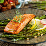 Salmon on a bed of asparagus