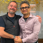 Salvador Ramon Mateo and Utham Gowda shaking hands