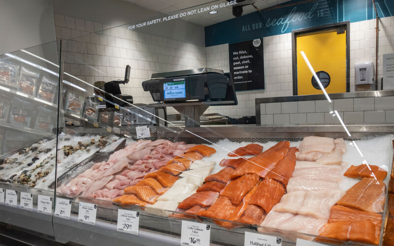 A seafood department display case