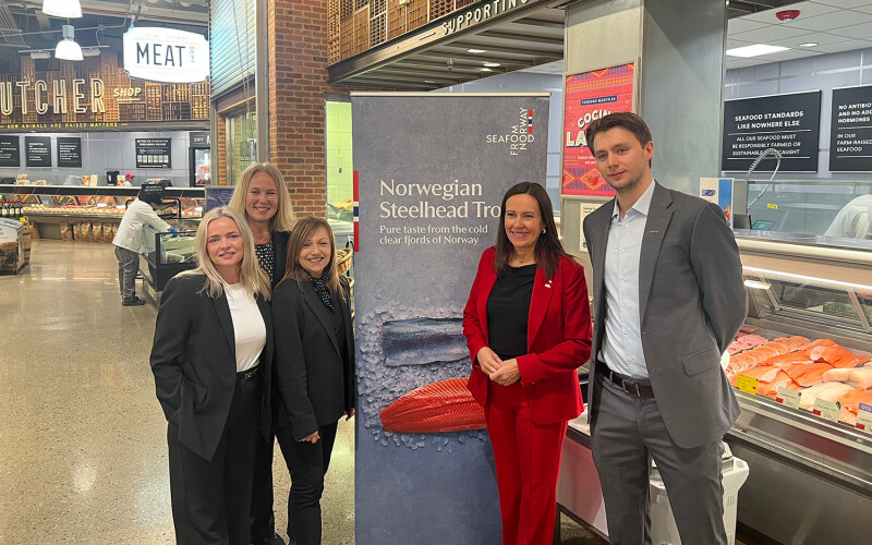 A delegation including Norwegian Fisheries Minister Marianne Sivertsen Næss (center right) toured a Whole Foods retail store in Boston, Massachusetts, U.S.A. on 15 March