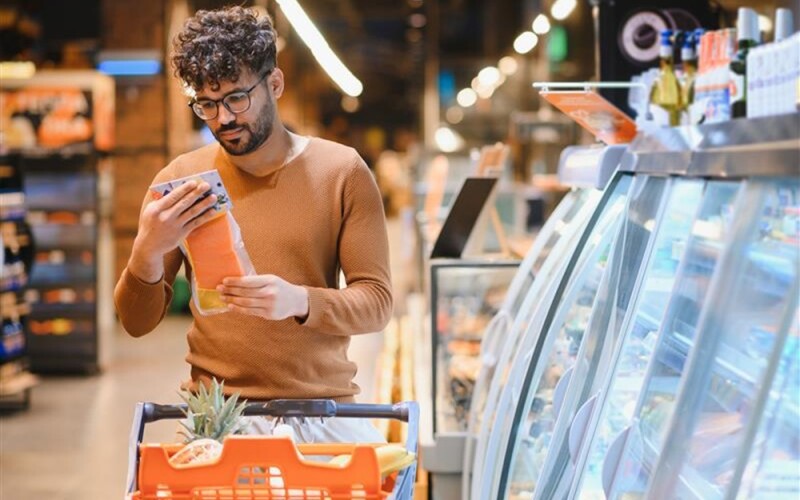 a person shopping for salmon