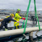 Men working at a Gigante Salmon aquaculture facility