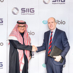 SIIG CEO Abdulrahman Alismail and Unibio CEO David Henstrom shake hands