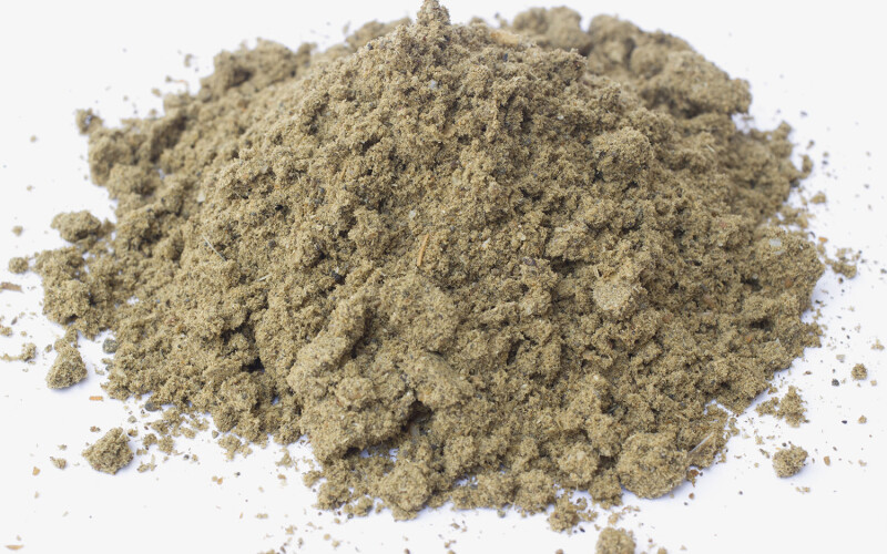 A pile of fishmeal on a white background