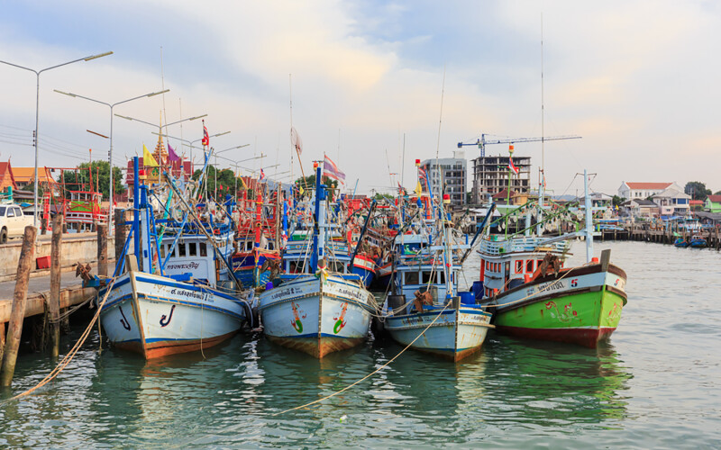 Thai fishing boats tied up at the dock