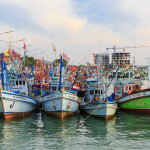 Thai fishing boats tied up at the dock