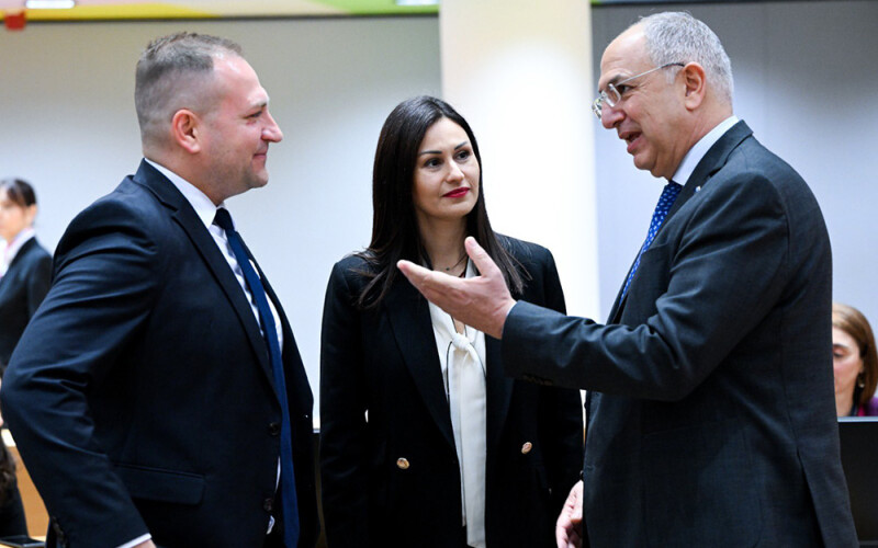 E.U. Commissioner for Fisheries and Oceans Costas Kadis talking with other officials