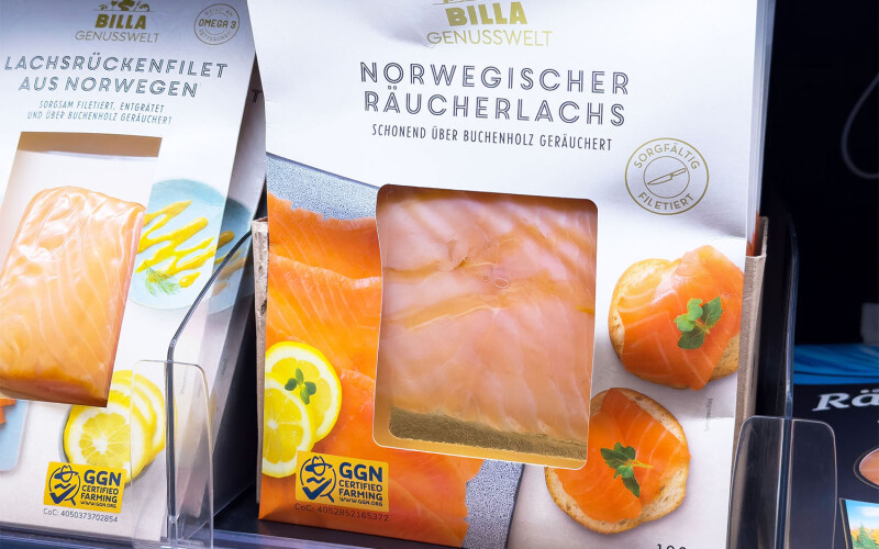 A package of Norwegian smoked salmon in a grocery display case in Austria