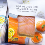 A package of Norwegian smoked salmon in a grocery display case in Austria