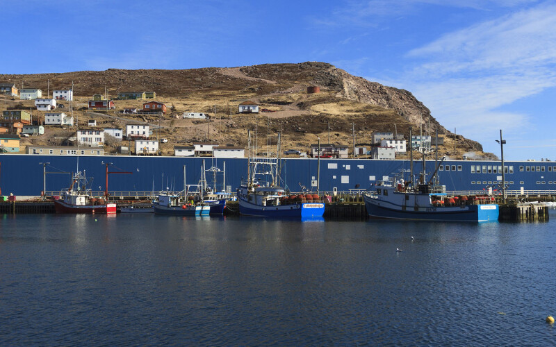 The exterior of a snow crab processing facility from the water