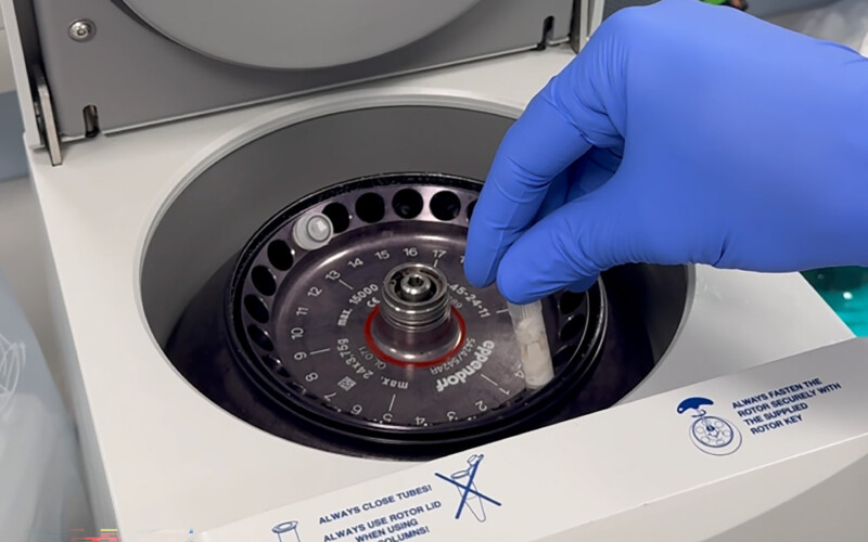 A scientist handling a sample
