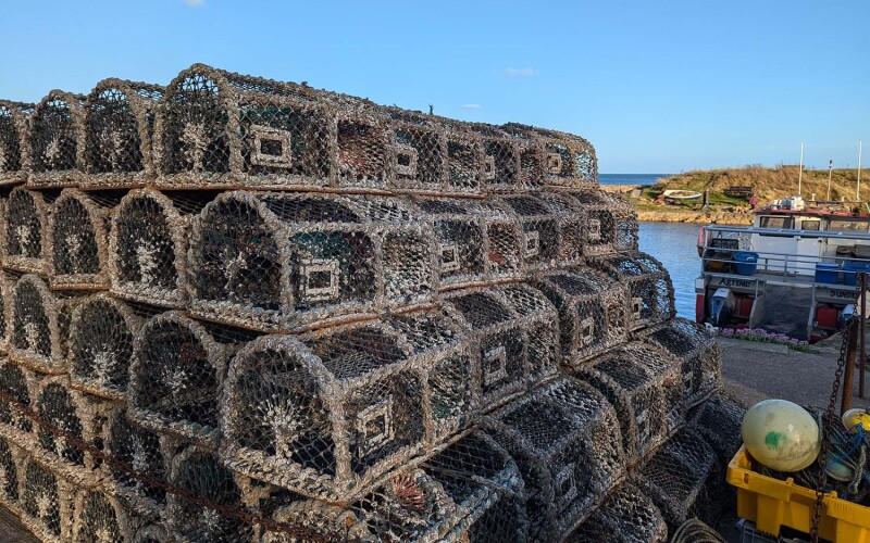 A pile of traps on a dock in Scotland