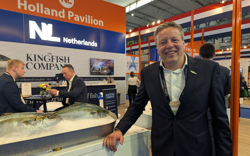 Kingfish Commercial Director Gudo Klein Gebbink posing with the company's products at Seafood Expo Global