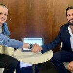 SFP Partnerships Engagement Specialist David Parreño Duque and Seafood Souq CEO Scott Chambers signing the agreement at the 2026 Seafood Expo Global