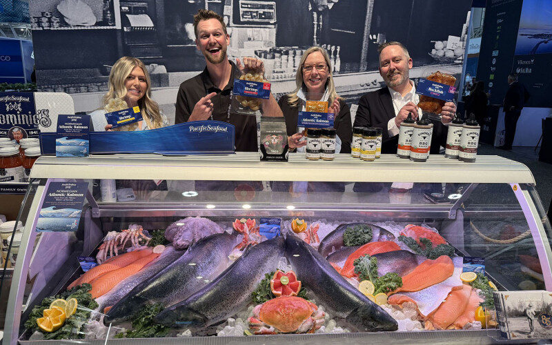 Pacific Seafood staff showing off the firm's new products in partnership with Kinder's